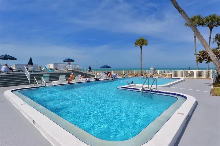 Community pool over looking the gulf and beach