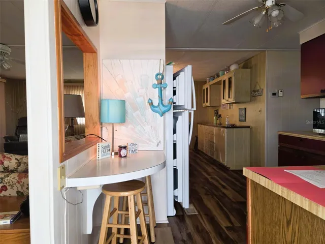 Entrance into the Kitchen Area with a small sitting area