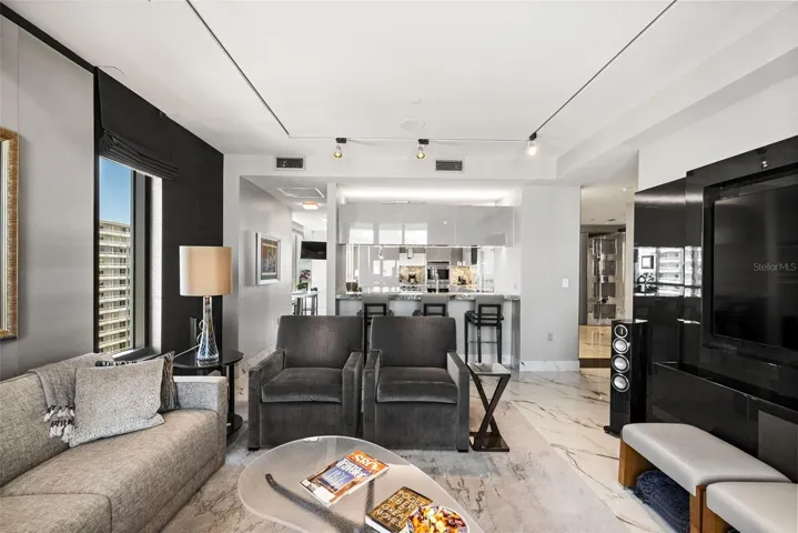Family room flowing effortlessly into the gourmet kitchen