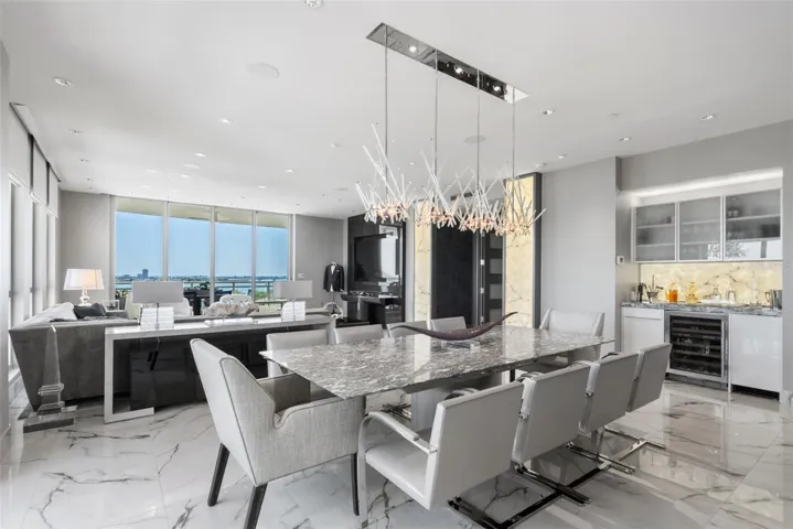 Dining space seamlessly connected to expansive outdoor living