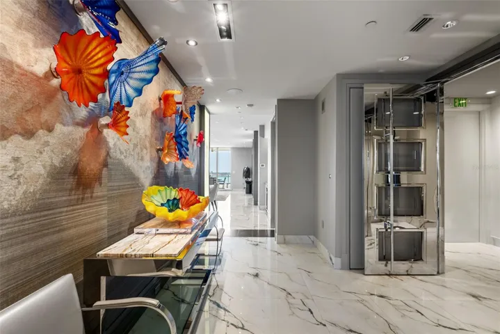 Refined gallery corridor showcasing rich finishes and sophistication