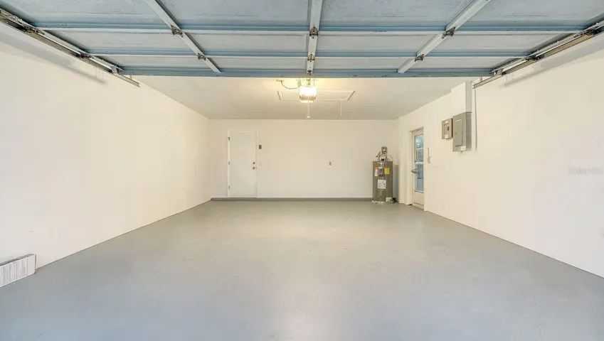 Immaculate 2 Car Garage with a Freshly Painted Floor