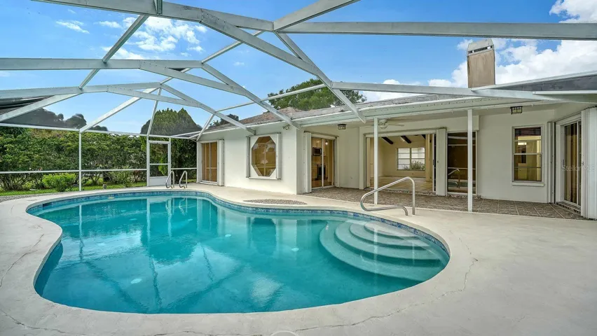 Plenty of space on the pool deck for outdoor furniture