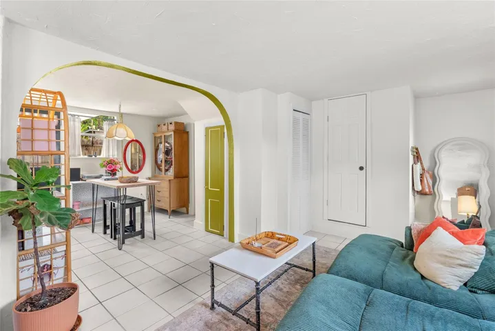 door on left has locks and gives access to the 2nd floor staircase that takes you to the top unit.
