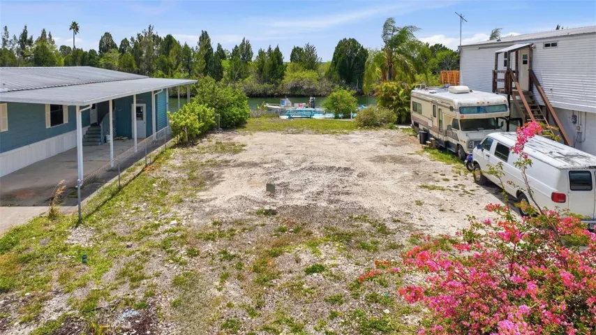 Amazing flat lot across for the Park so you will never be looking at a neighbor, only sunsets!
