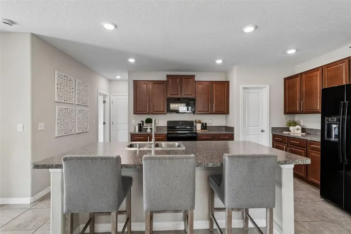 with a guest room right off the kitchen that is utilized currently as an office.