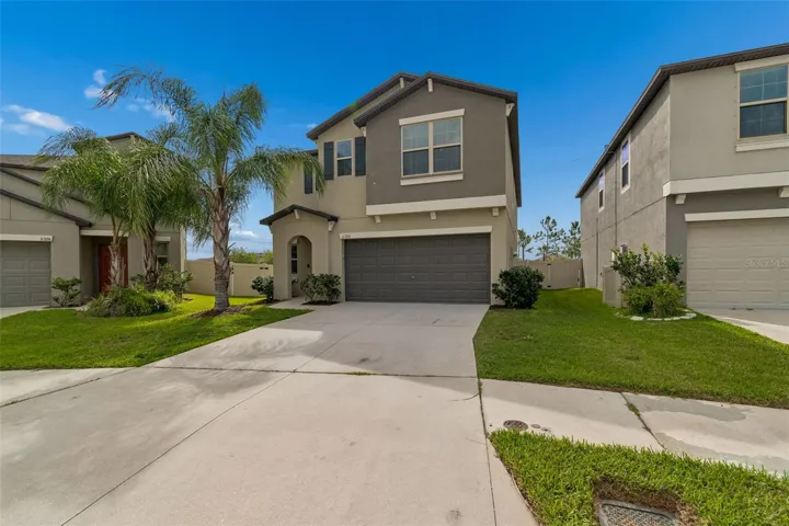 Ready to see the home? Mature landscaping and beautifully maintained property