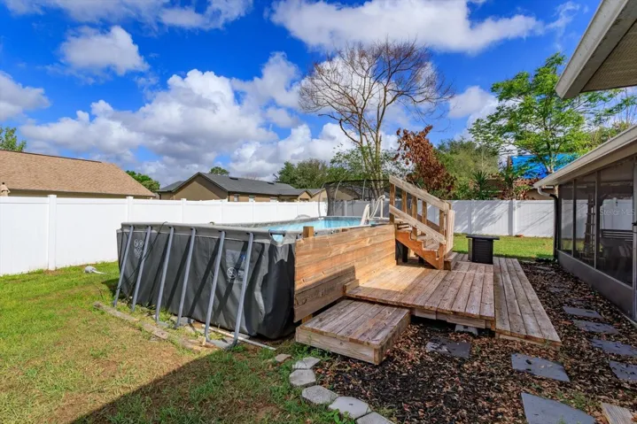 Above ground pool with new decking
