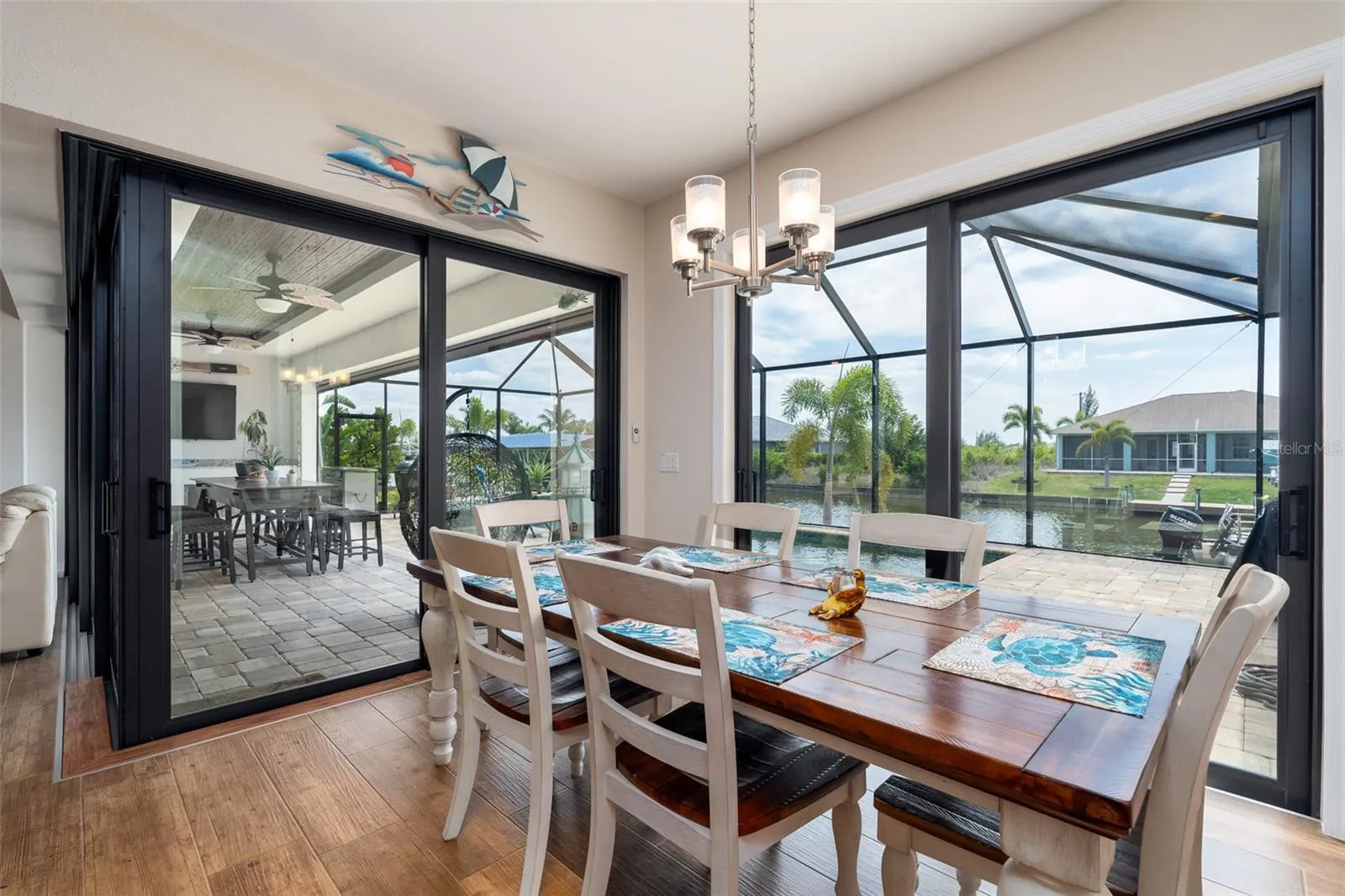 Dining Room with Chandelier and Sliding Doors