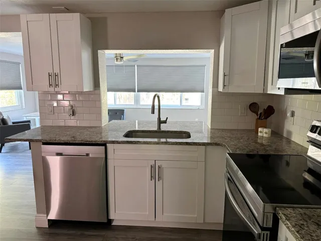 Kitchen overlooking great room