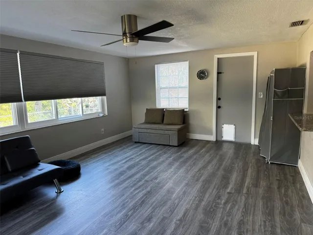 Spacious great room with back yard access