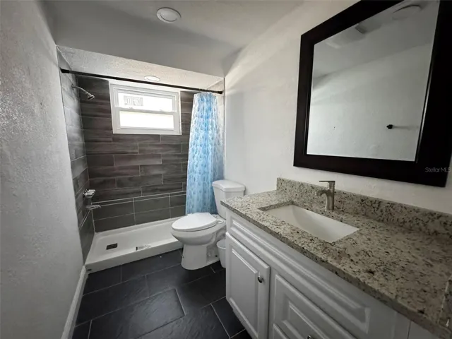 hall bath - shower, to tub