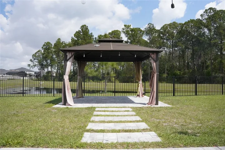 Backyard space with ideal for outdoor gatherings.