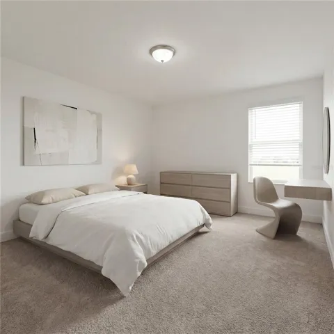 Comfortable secondary bedroom with great natural light.
