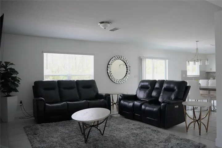 Bright and spacious living area with abundant natural light.