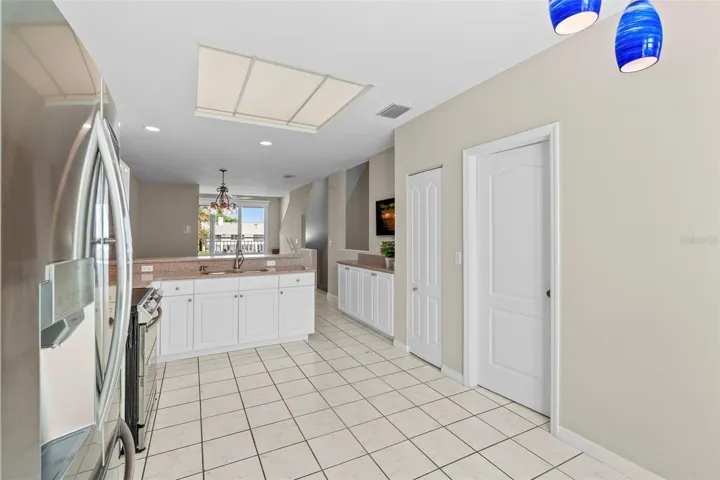 Large Kitchen open toward the Dining and Living Rooms