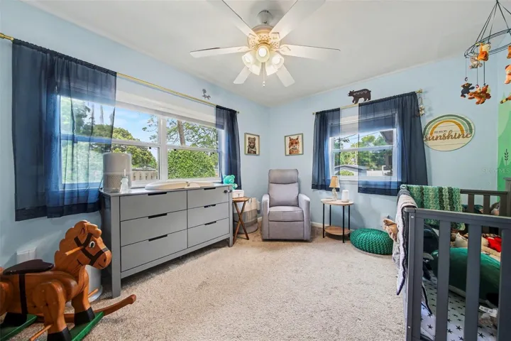 Bright Bright Bedroom or Nursery with built-ins