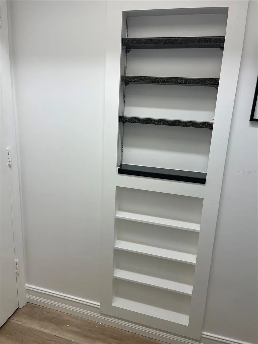 Built in thick granite shelving