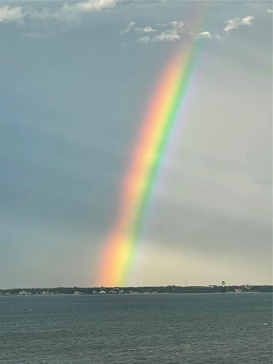 Sarasota bay hosts an afternoon shower in the sun