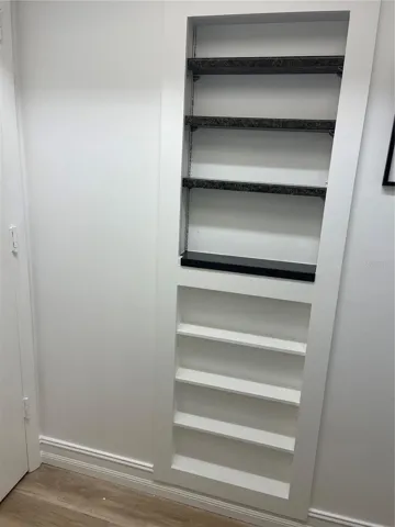 Built in thick granite shelving