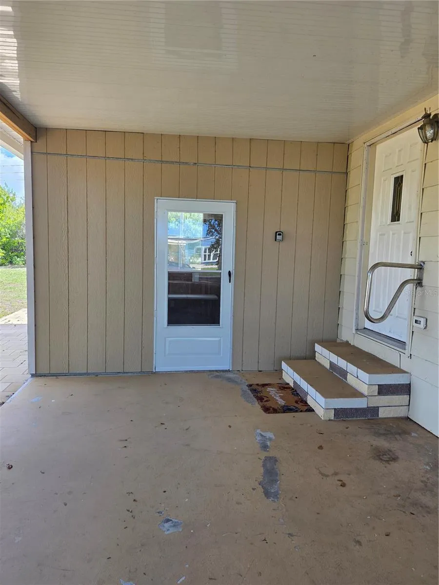 Side entry/laundry door