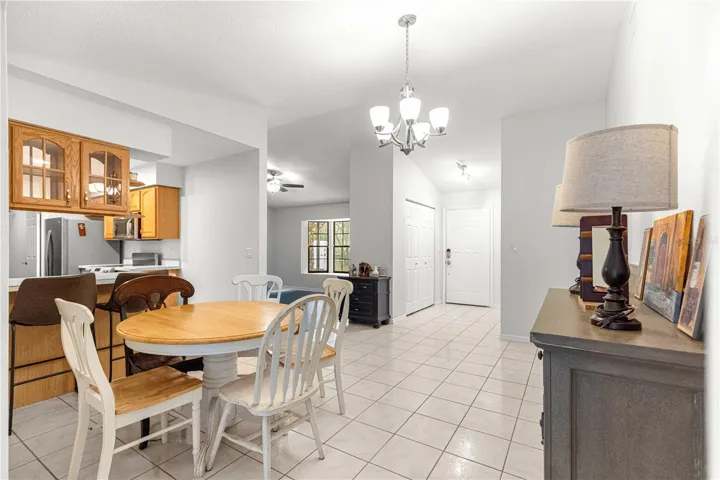 view of entry dining area and peek into living area