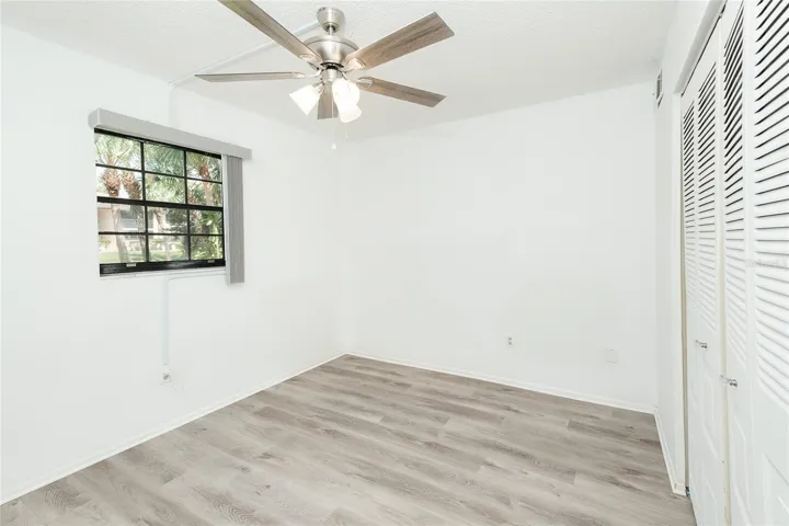 Guest Bedroom with new LVT Flooring and new Window Blinds