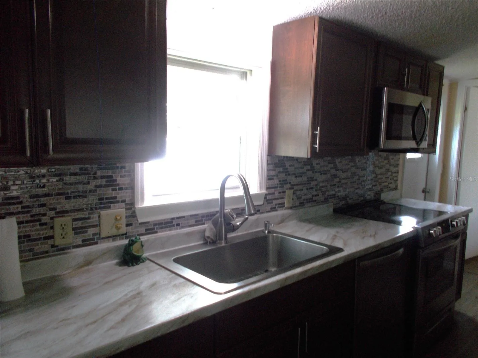 Kitchen showing Farm Sink