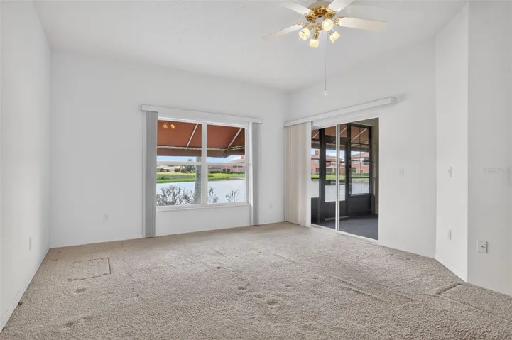 Master Bedroom with water view and sliding glass doors