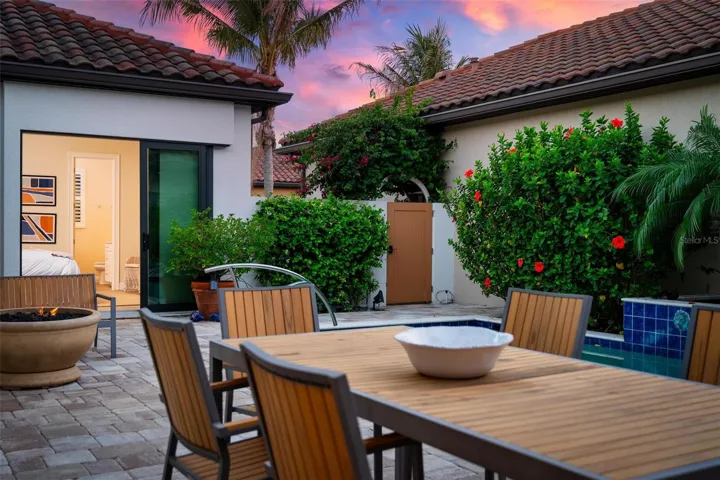 Sliders to guest casita en-suite and garden arbor to rear alleyway