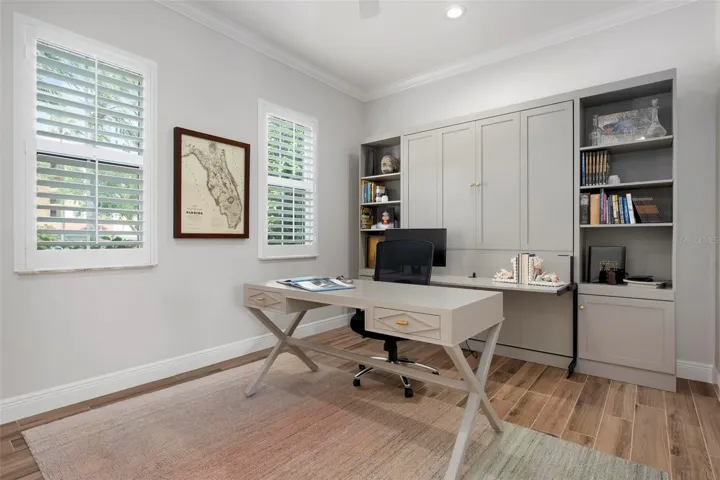 Study/den with custom built in Murphy bed and integrated desk