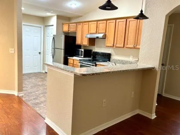 breakfast bar looking over kitchen