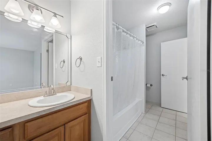 Primary Bedroom Vanity leading into Bathroom