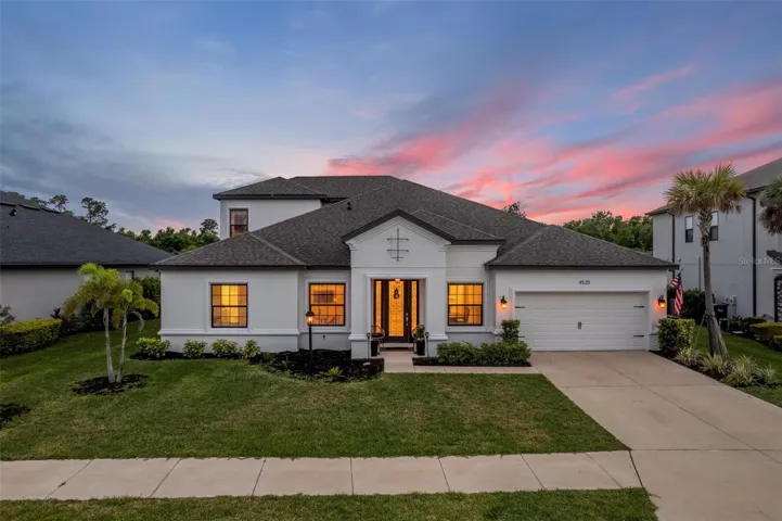 The Florida lifestyle awaits in this one of a kind Lakewood Ranch Home