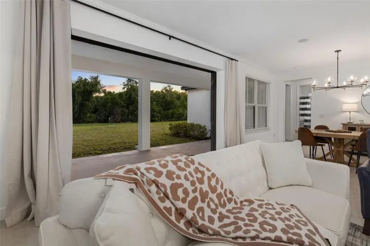 Expansive Living Area with Triple Pock Sliders