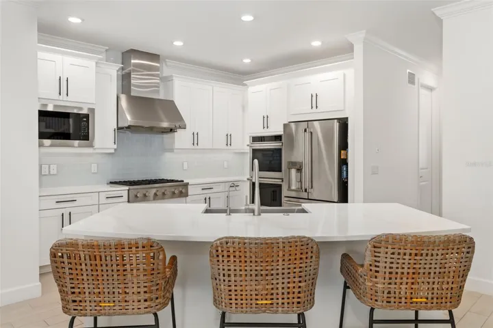 Large Kitchen Island in Gourmet Kitchen, great for entertaining or homework.