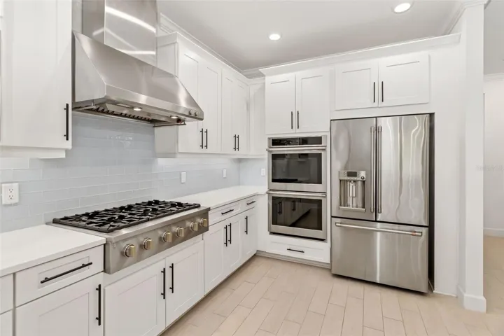 Gourmet Kitchen with 6 Burner Monogram Natural Gas Cooktop