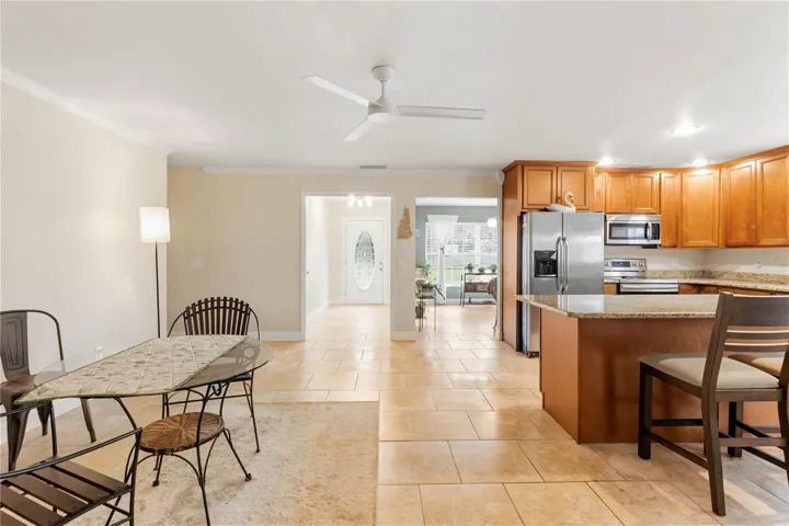 View of entry from family room/kitchen and dining room