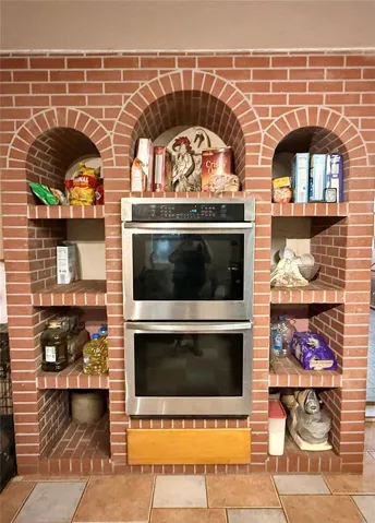 Double baker's oven built into brick hearth!