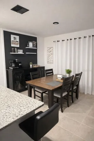 Breakfast Nook with accent wall and shelves