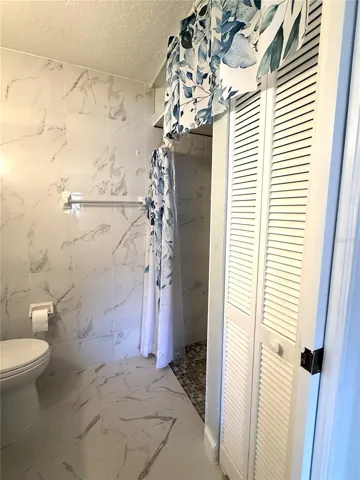 Master Bathroom with linen closet.