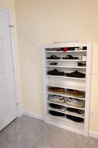 Custom Shoe Rack in foyer.