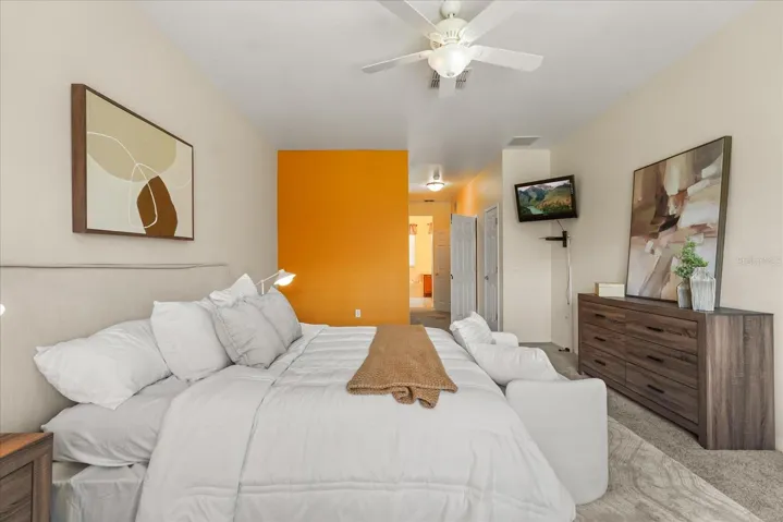 Primary bedroom with back porch access