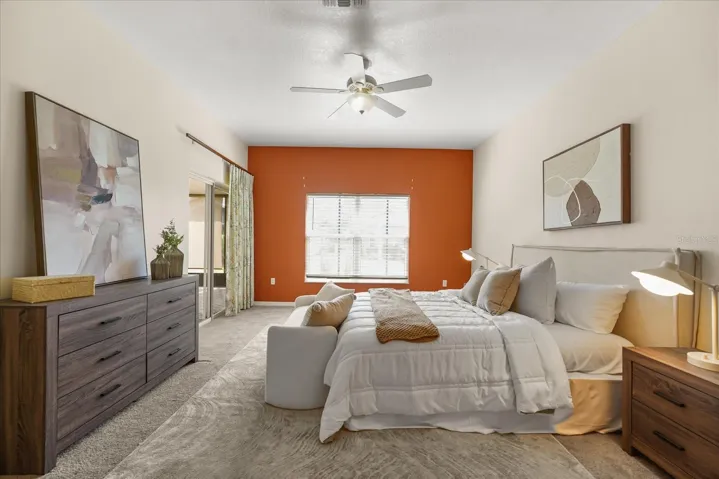Primary bedroom with back porch access