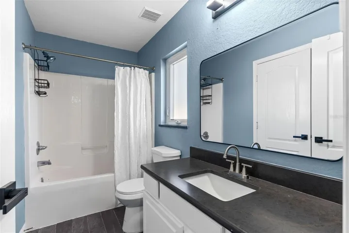 Large master suite featuring a walk-in closet.