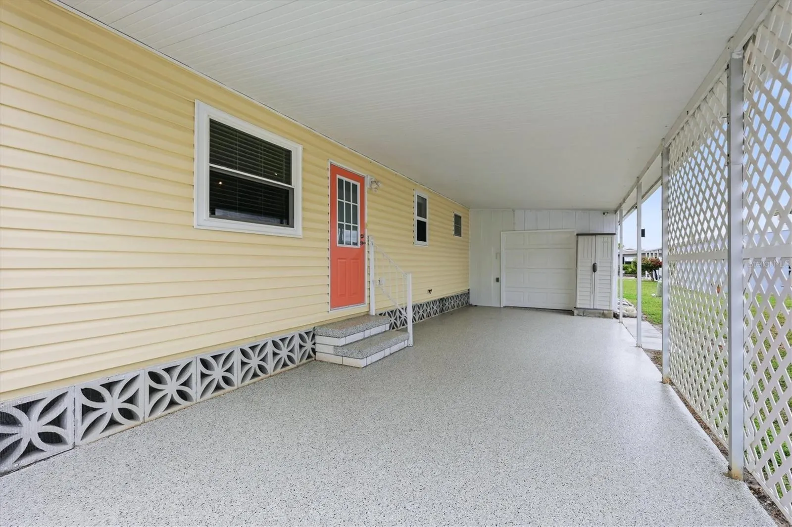 Carport/Golf Cart Parking shed with garage door