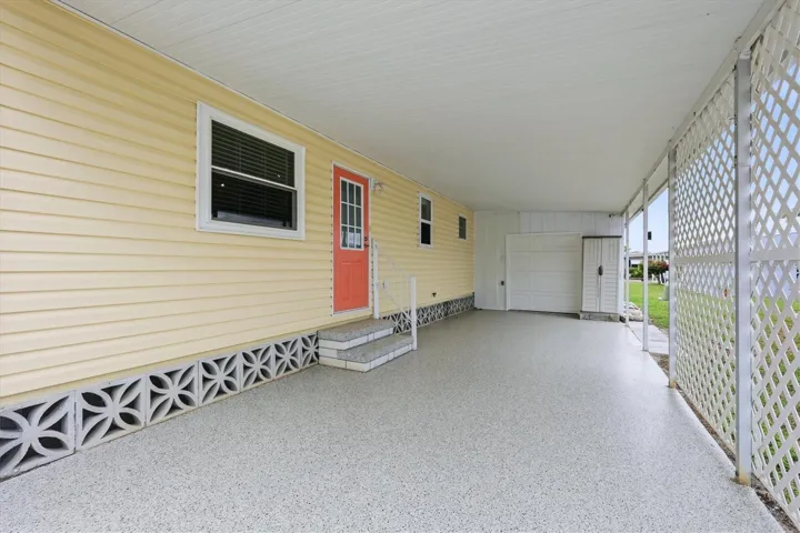 Carport/Golf Cart Parking shed with garage door