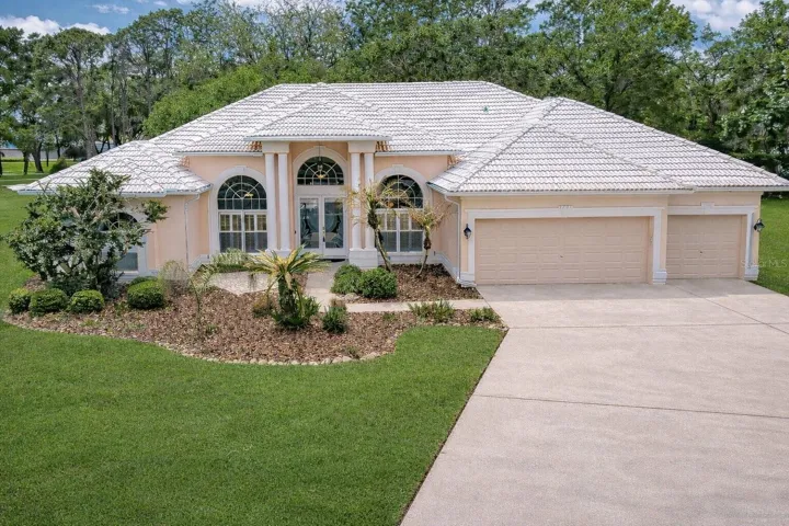 Welcome to your private retreat in the gated community of River Hills!