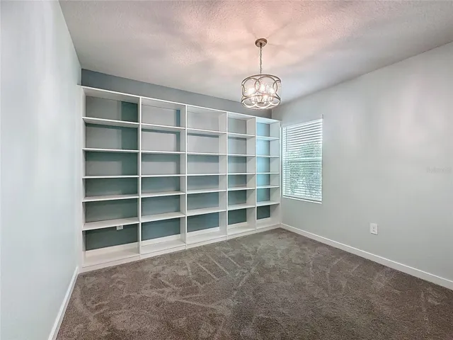 Custom built closet in third bedroom
