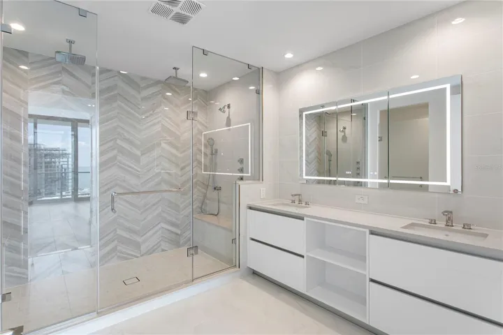 Primary Bathroom with dual vanities.